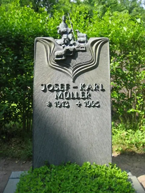 Grabstele mit plastisch gearbeitetem Bronzerelief und Bronzeschrift